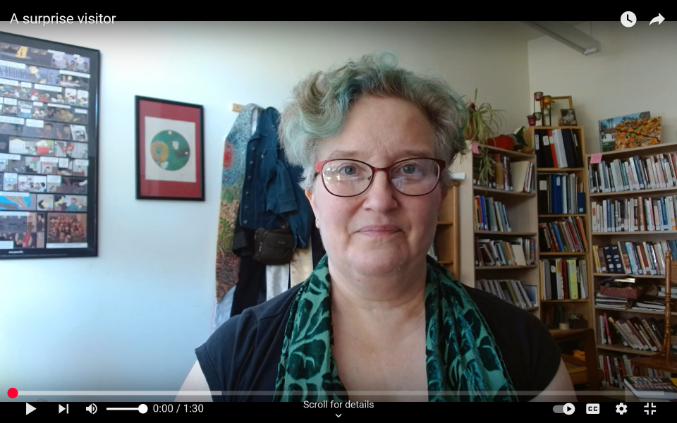 A middle-aged white woman (Parish Minister Amy Zucker Morgenstern) sitting in her office